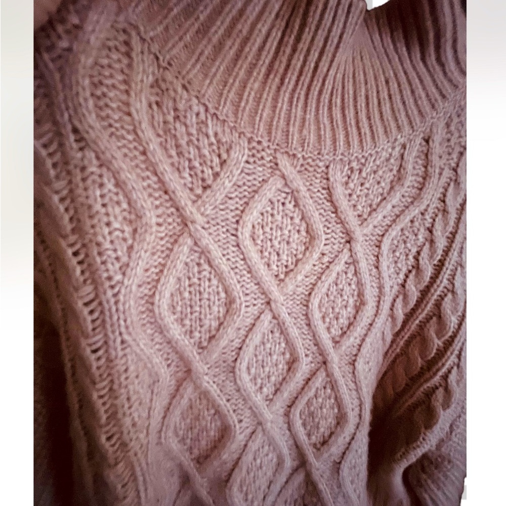 Soft cozy mauve pink sweater. Not itchy and keeps you warm.